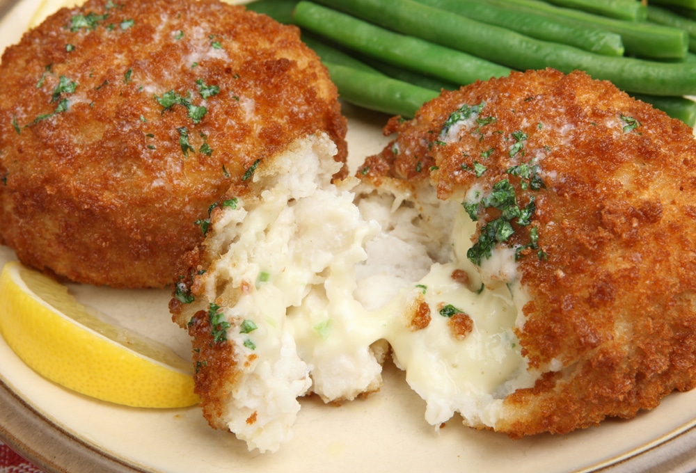 Haddock fishcakes served with green beans.